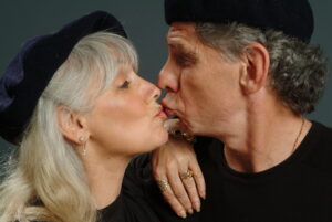Errol & Rochelle Strider lightly kissing